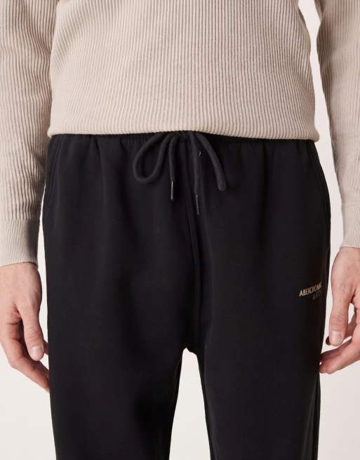 Abercrombie & Fitch logo detail relaxed cuffed jogger in black, 4 of 5