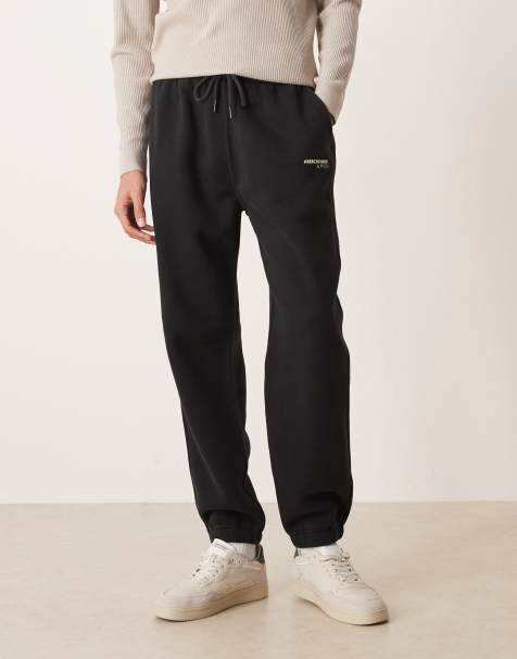 Abercrombie & Fitch logo detail relaxed cuffed sweatpants in black - view 1