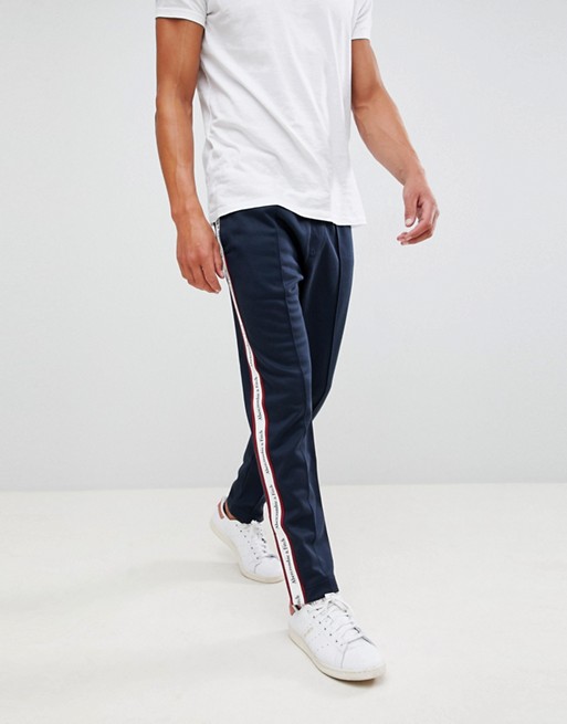 Abercrombie & Fitch logo side tape tricot track pant in navy | ASOS