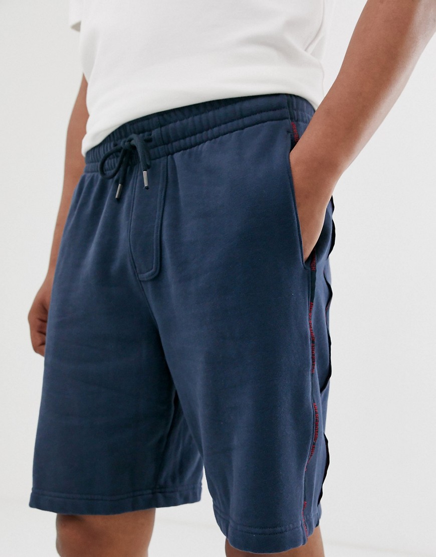 Abercrombie & Fitch logo side taping sweat shorts in navy