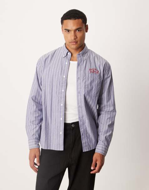 Abercrombie & Fitch long sleeve preppy chest graphic shirt in striped blue - view 1