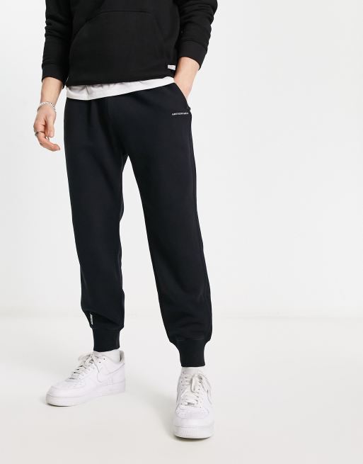 Abercrombie & Fitch microscale logo cuffed joggers in black | ASOS