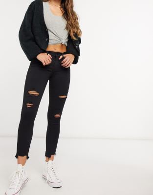 mid rise black ripped skinny jeans