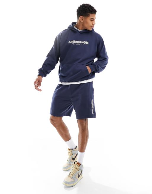 Abercrombie & Fitch - Mix & Match - Felpa con cappuccio e logo ricamato a punto catenella in tessuto French Terry color blu scuro