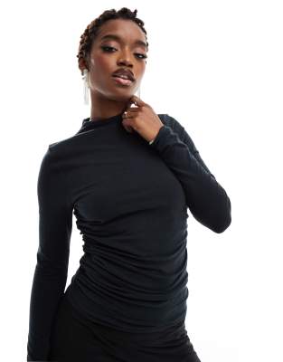 mock neck long sleeve top in black with side ruching