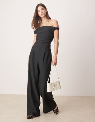 off-the-shoulder draped jumpsuit in black