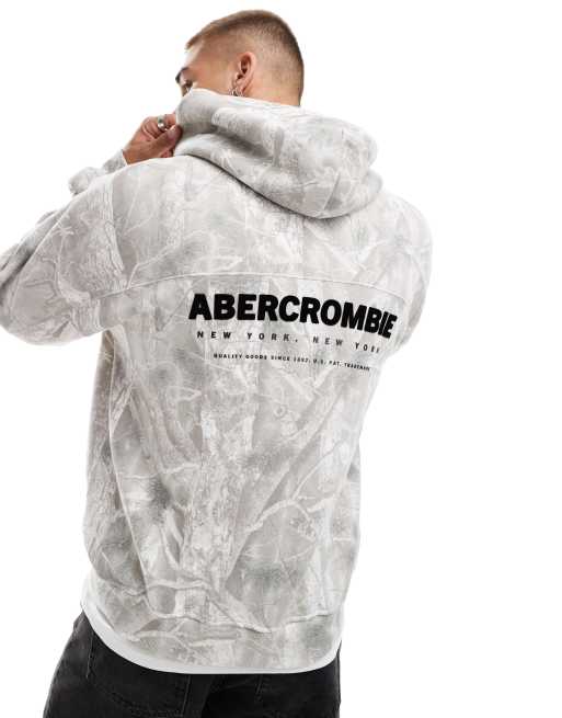 Abercrombie & Fitch - Oversized hoodie met geflockt logo op de achterkant en bladvormige camouflageprint in lichtgrijs