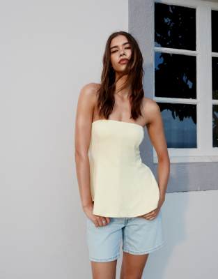 peplum tube top in pastel yellow