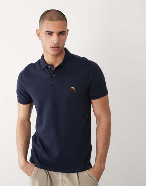 Abercrombie & Fitch - Polo a maniche corte con logo blu navy - view 1