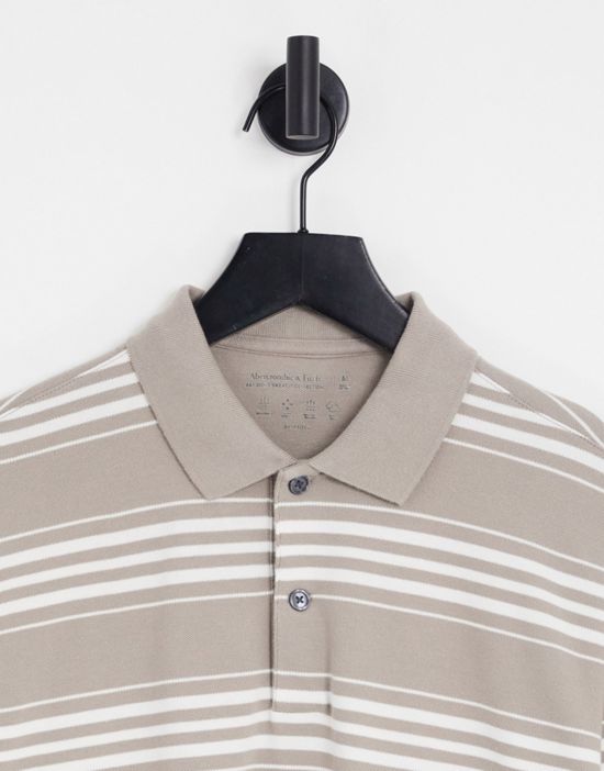 https://images.asos-media.com/products/abercrombie-fitch-polo-shirt-in-stone/202921492-2?$n_550w$&wid=550&fit=constrain