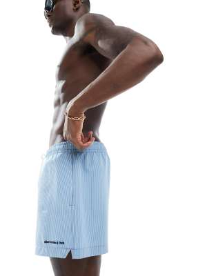 Abercrombie & Fitch logo 5in pull on stripe seersucker swim shorts in light blue - ASOS Price Checker
