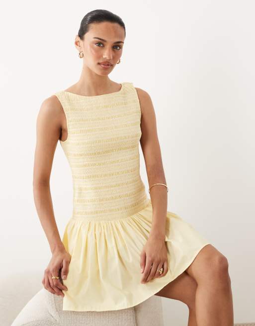Abercrombie & Fitch slash neck smocked skort mini dress in butter yellow |  ASOS