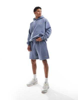Abercrombie & Fitch Abercrombie & Fitch small scale logo baggy fit sweat shorts in light blue
