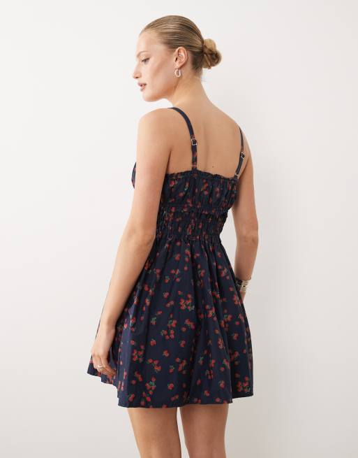 Abercrombie & Fitch strappy mini smock dress in navy strawberry print | ASOS