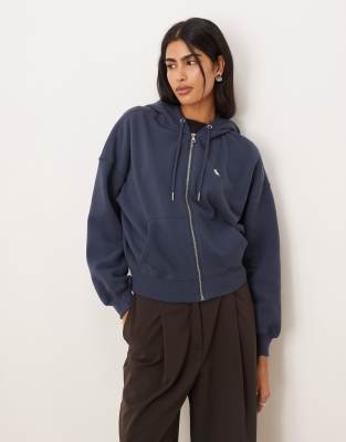 Abercrombie & Fitch - Sweat à capuche zippé en polaire avec logo emblématique - Bleu marine