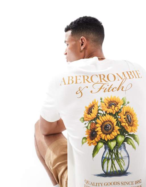 Abercrombie & Fitch - T-shirt met gebloemde logoprint op de achterkant in wit