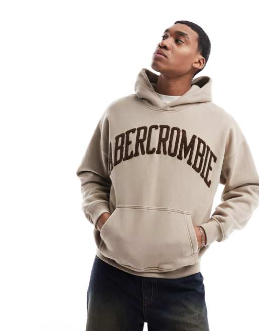 Abercrombie u0026 Fitch tonal varsity logo oversized hoodie in tan | ASOS