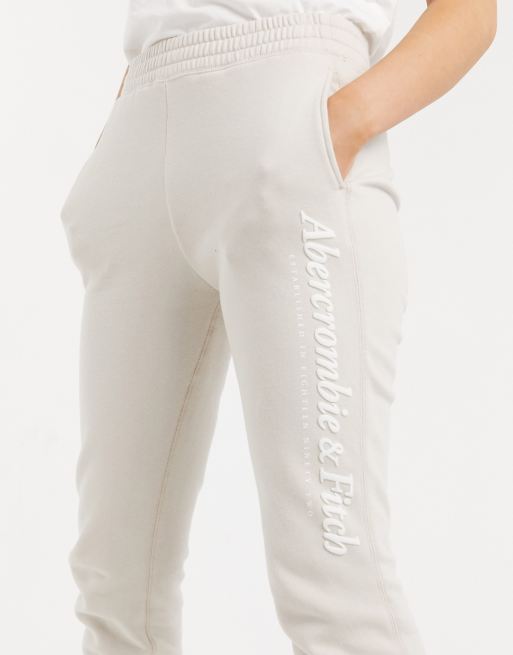 Abercrombie Fitch vertical logo sweatpants in cream ASOS