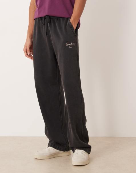 Abercrombie & Fitch – Weite Basic-Jogginghose in Schwarz mit offenem Saum und Grafikmotiv - view 1