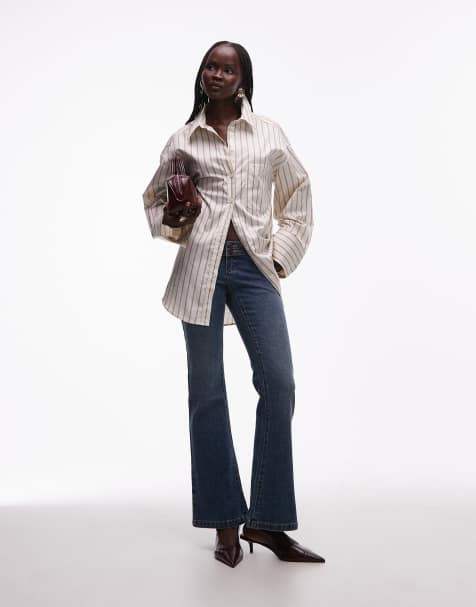 Abrand Jeans – 00 – Schlagjeans in verwaschenem Indigoblau mit superniedrigem Bund - view 1