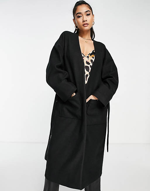 Abrigo negro de corte holgado extragrande con diseño minimalista y bolsillos de Pretty Lavish