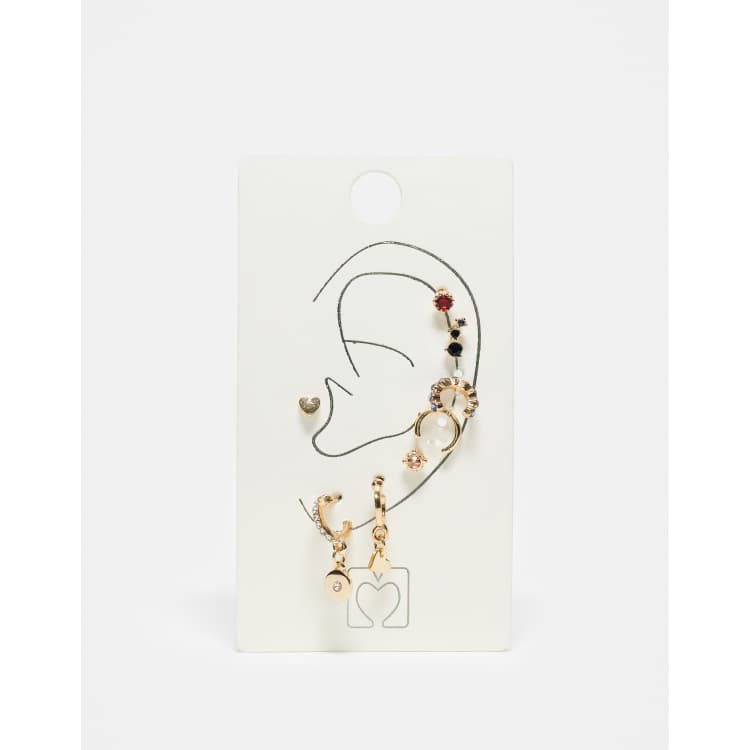Accessorize 8 pack earrings in gold ASOS