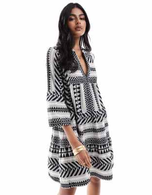Accessorize Accessorize aztec print mini beach kaftan in dark brown and white