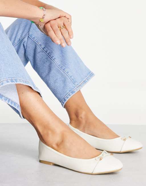 Accessorize ballet flats in beige