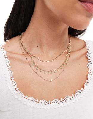 Accessorize bead and chain multirow necklace in gold | ASOS