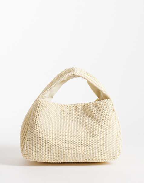 Accessorize beaded handheld bag in butter yellow - view 1