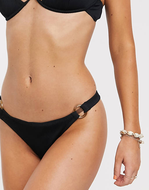 Accessorize bikini bottom with ring detail in black rib