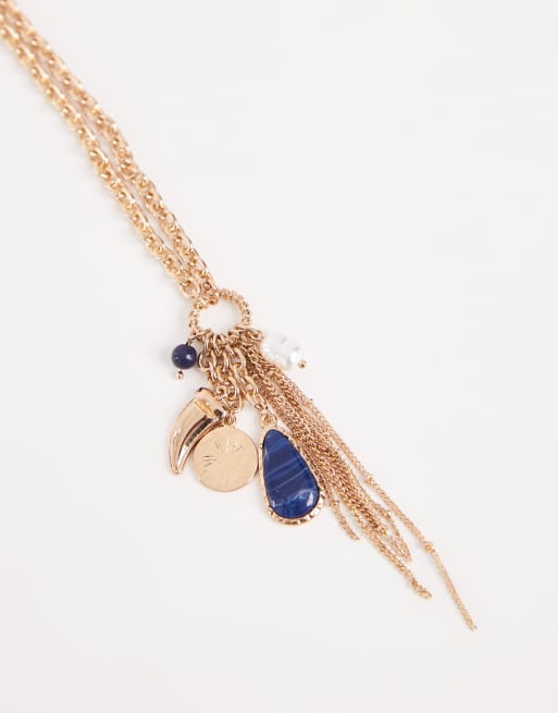 Accessorize blue gem charm long pendant necklace in gold | ASOS