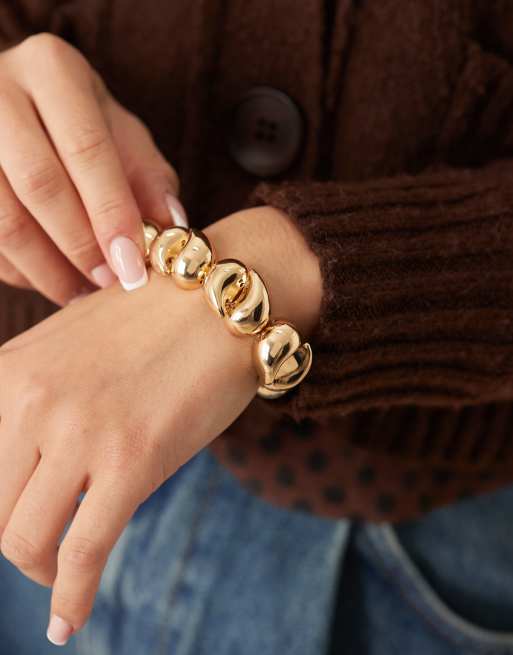 Accessorize - Bracciale rigido elasticizzato dorato con design a gocce