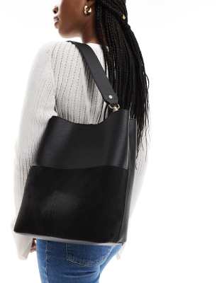 Accessorize bucket bag with faux suede in black