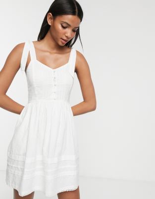 white midi dress with buttons