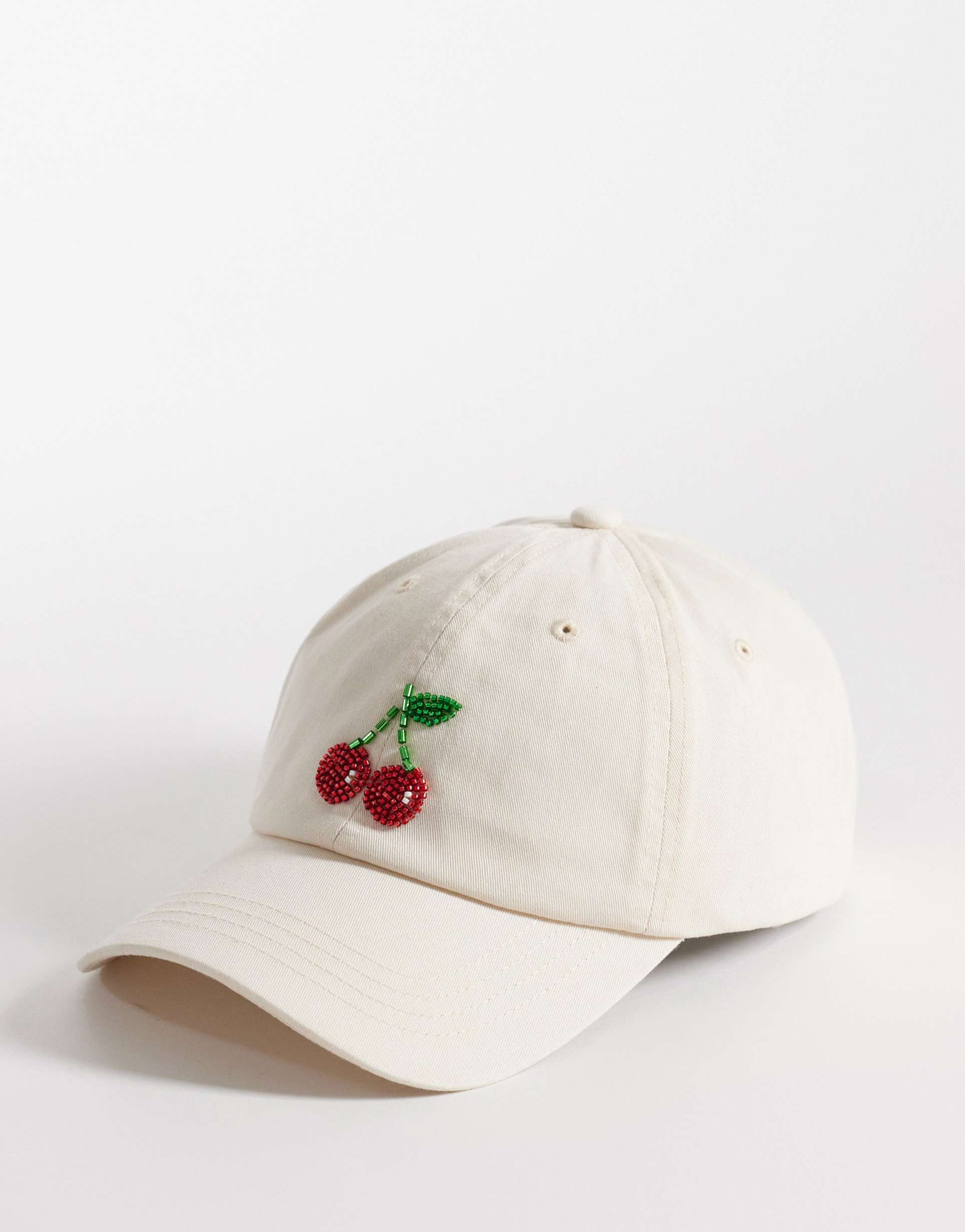 accessorize cherry beaded cap in beige