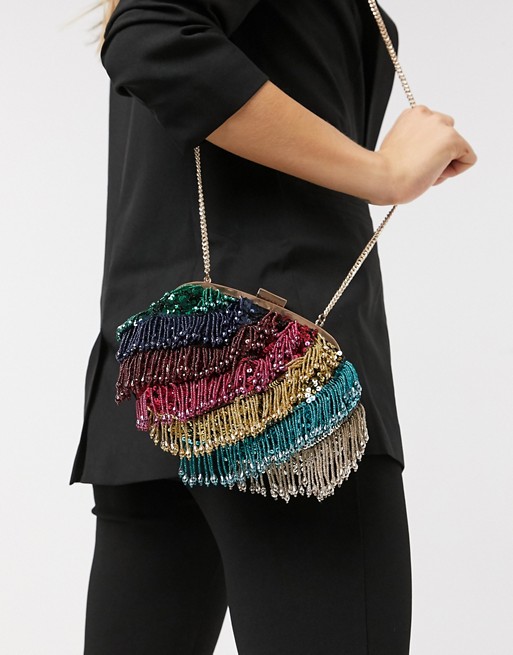 Accessorize clutch bag with chain strap and tassles in rainbow