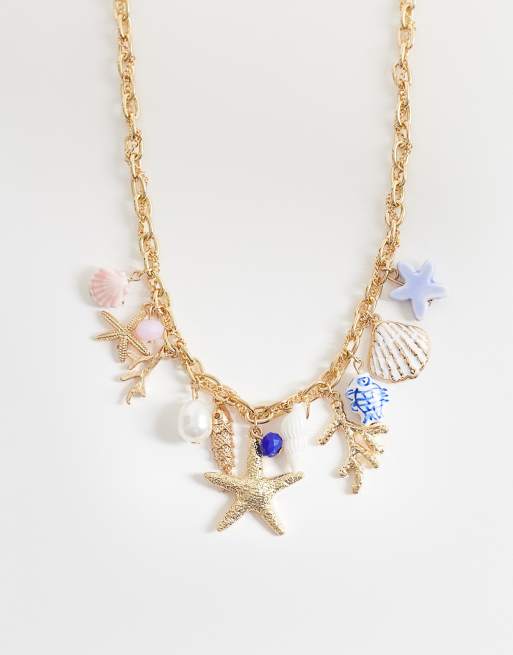 Accessorize - Collana con charm grandi con stelle marine multicolore