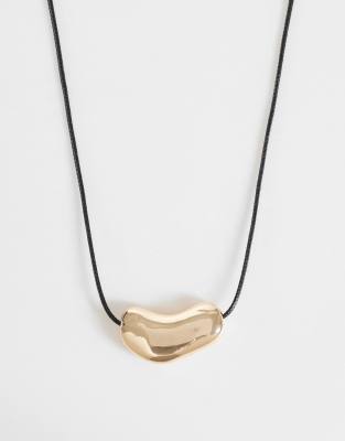 Accessorize - Collier en corde avec pendentif galet - Doré