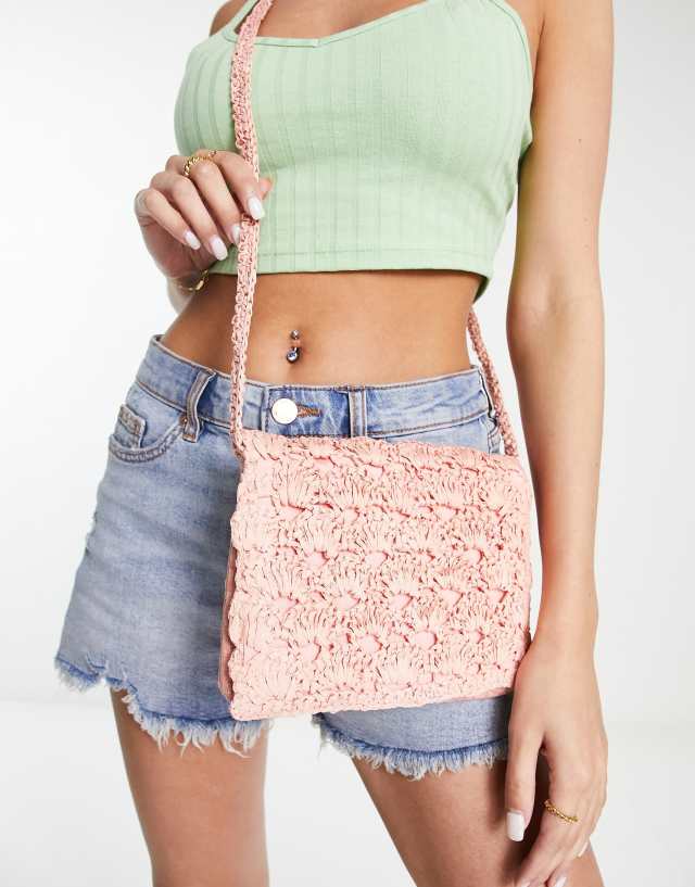 Accessorize cross body bag in peach straw