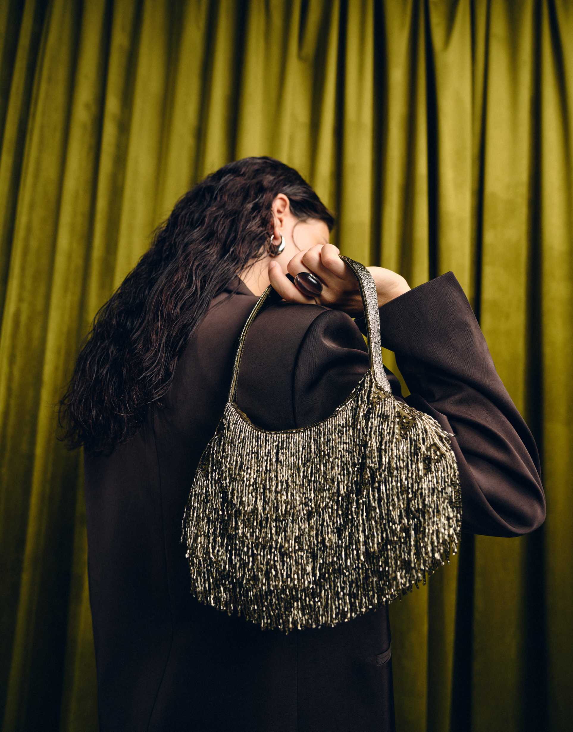 accessorize drop bead fringed handheld bag in olive green