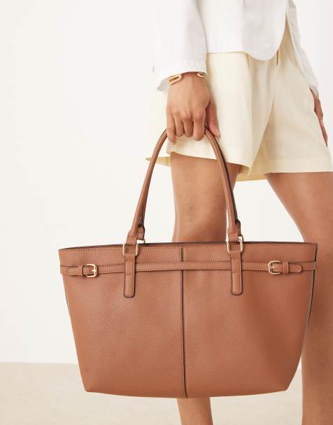 Accessorize east to west tote shoulder bag with buckle detailing in tan - view 1