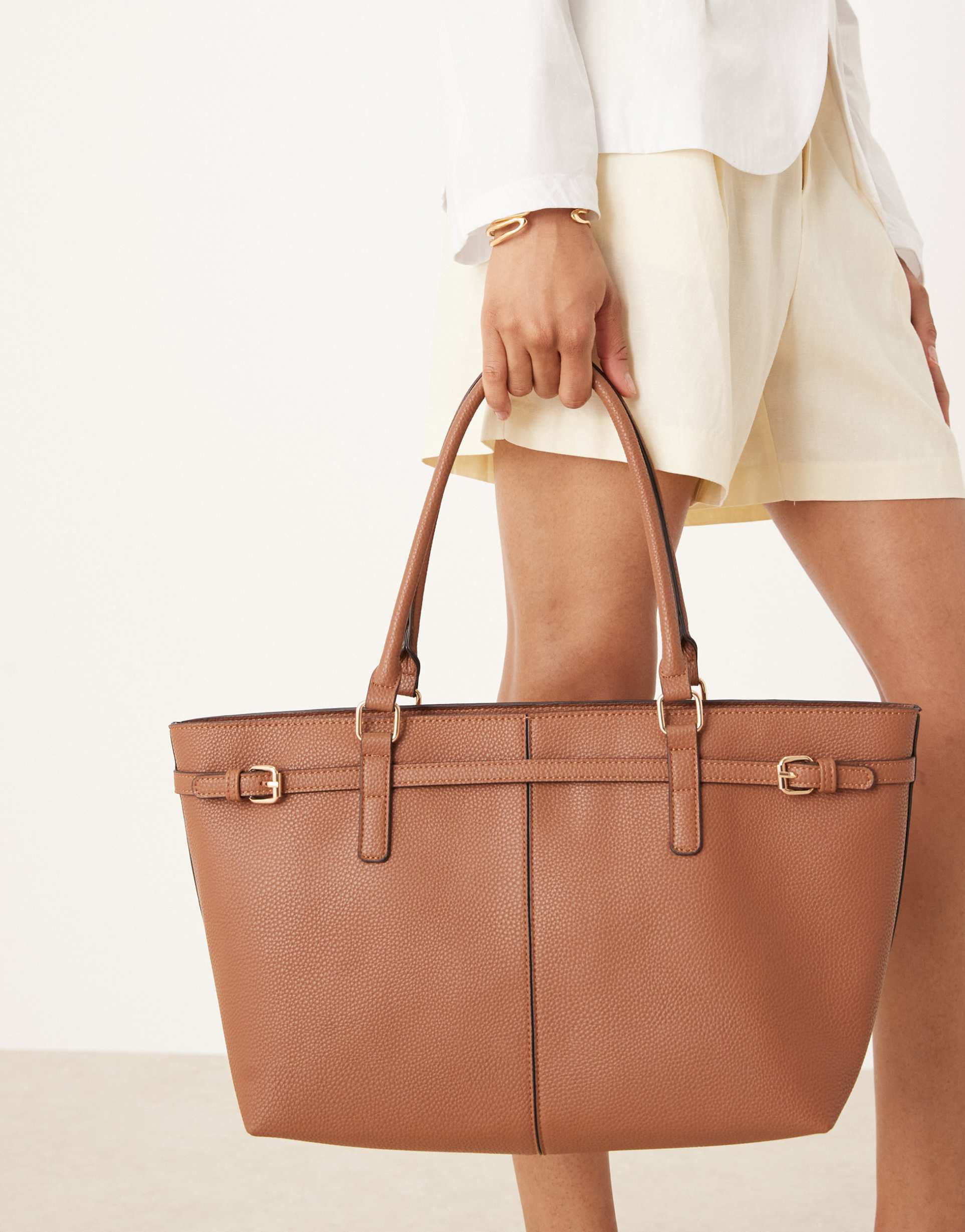 accessorize east to west tote shoulder bag with buckle detailing in tan