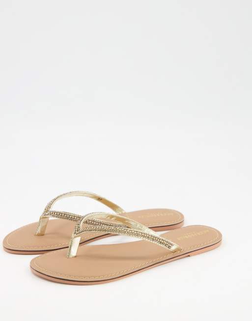 Embellished store flip flops