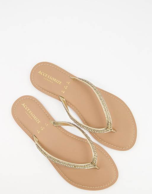 Gold embellished store flip flops