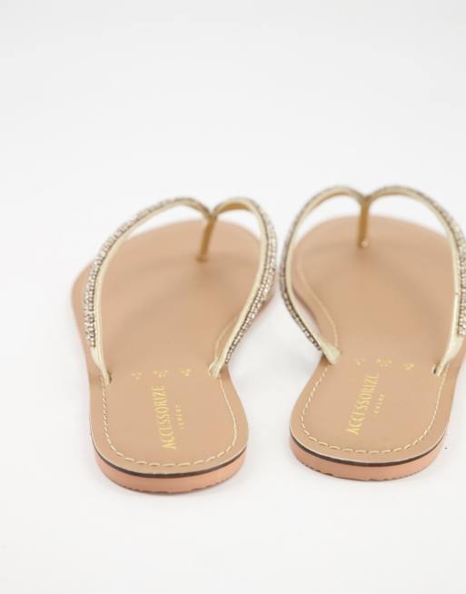 Gold embellished store flip flops