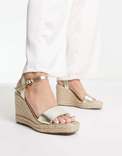 Accessorize espadrille wedges in gold