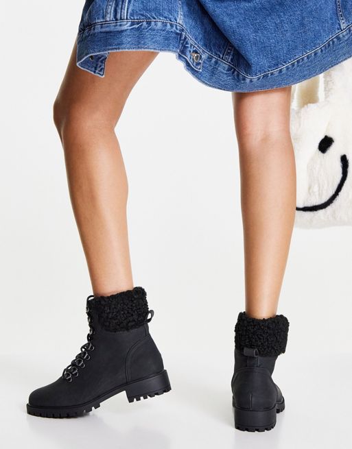Accessorize flat ankle boots in black faux suede