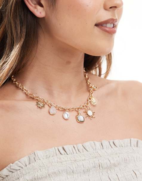 Accessorize – Goldfarbene Halskette mit verschiedenen Anhängern und Sonnenmotiv - view 1