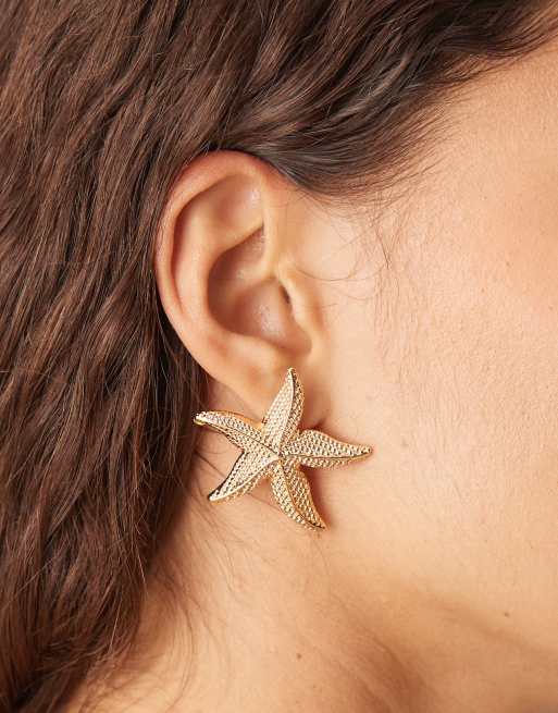 Accessorize - Guldfarvede statement-ørestikker med søstjerne-design